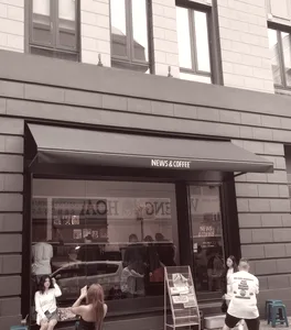 The News & Coffee shopfront on a Kuala Lumpur street, shot on Kachak.
